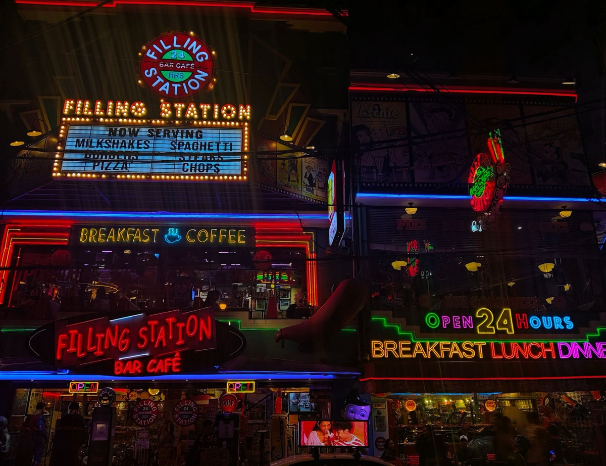 Vibrant neon cityscape reminiscent of classic cyberpunk animation